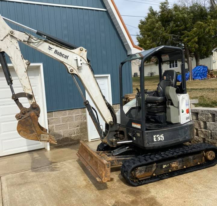 Moore Home Services Heavy Equipment Pressure Washing